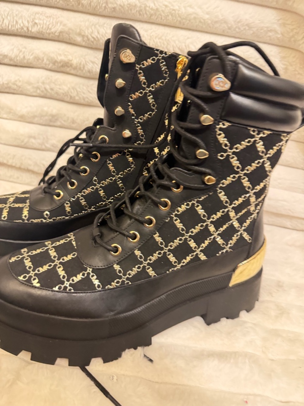 Michael Kors Black Quilted Lace-Up Platform Boots with Gold Accents